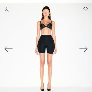 Butt and hip enhancing mid thigh shorts